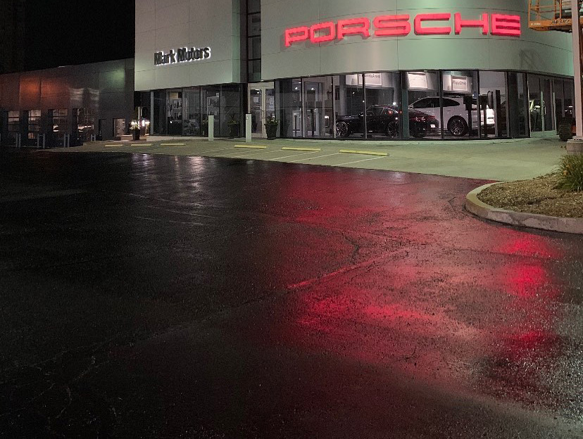 car dealership parking lot after the asphlat was sealed